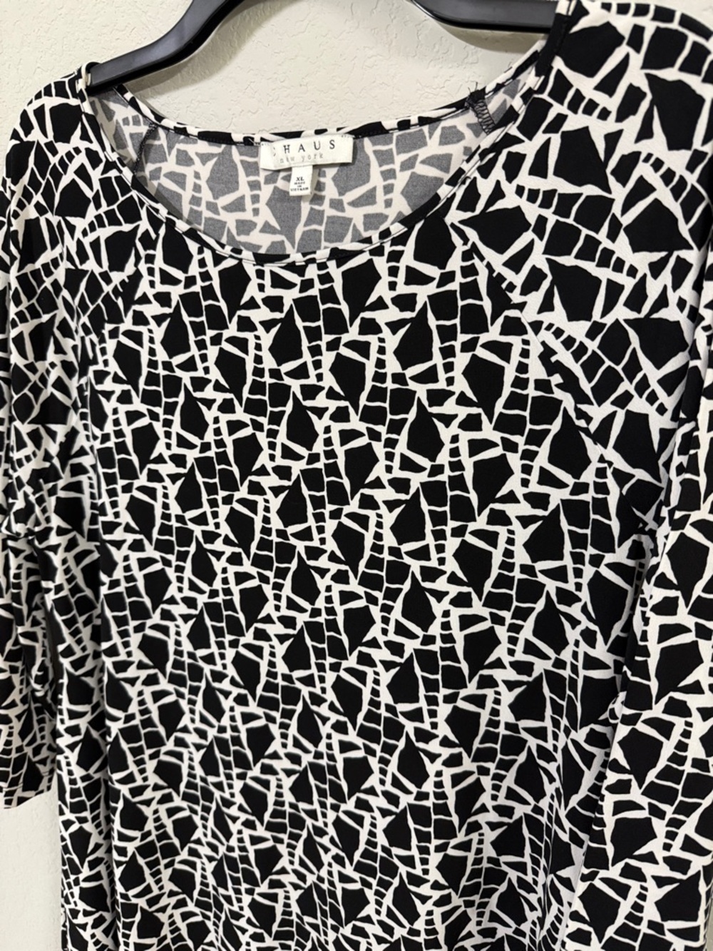Chaus Geometric Handkerchief Hem Tunic Top.